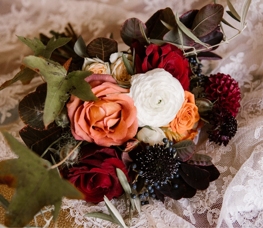 close up of dark floral wedding bouquet by Albuquerque Florist: Bagel's Florals