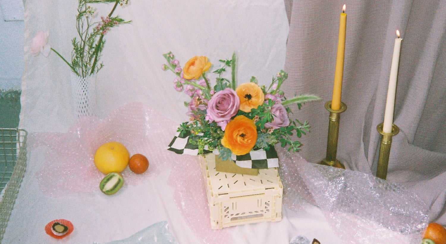 Tablescape featuring colorful bouquet by Bagel's Florals based in Albuquerque, New Mexico.